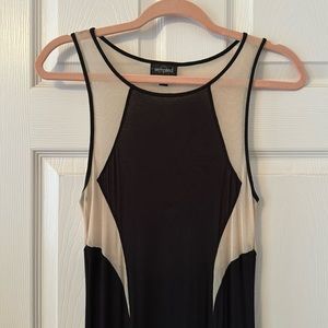 Full length black dress with sheer detail